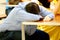 Businessman sleeps on desk after Tired overworked