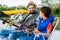 Businessman spending time with son and fishing together