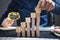 Businessman stacking wooden empty cubes