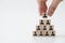 Businessman stacking wooden team blocks