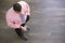 Businessman standing indoors looking at phone