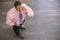 Businessman standing indoors using cellular phone