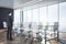 Businessman standing in luxury meeting room