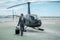 Businessman standing near private helicopter