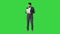 Businessman standing and reading papers seriously on a Green Screen, Chroma Key.