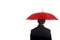 Businessman standing umbrella.