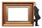 Businessman stands near Picture frame baget