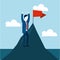 Businessman strategy with red flag in the mountains