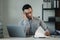 Businessman is stressed because of business problems in the office, worried about the company\\\'s problems