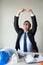 businessman stretch hands to relief back pain