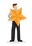 Businessman in suit holding a giant star