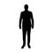 Businessman in suit standing, silhouette