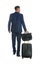 Businessman with suitcase and bag for vacation trip on background, back view. Summer travelling