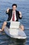 Businessman on Surfboard