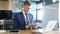 businessman surfing smartphone in office