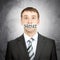 Businessman with tape over his mouth