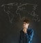 Businessman, teacher or student with world geography map on chalk background