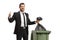Businessman throwing a waste bag in a garbage bin and showing thumbs up