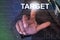 Businessman touching target button on virtual screen