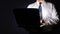 Businessman Typing on Laptop in The Dark