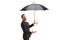 Businessman with umbrella checking weather