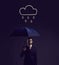 Businessman with umbrella standing under the rain. Dark, dramatic background. Business, failure, crisis, concept.