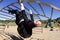 Businessman Upside Down in Playground