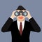 Businessman use binoculars looking for money