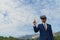 Businessman uses VR-headset to display a virtual reality