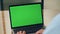 Businessman using chroma key laptop table closeup. Unknown boss looking computer
