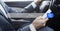 Businessman Using Smartphone While Driving Car With Empty Search Bar On Foreground