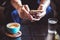 businessman using smartphone to read investment news and reply email to confirm meeting in coffee shop. man drinking latte coffee