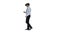 Businessman in virtual reality headset walking in virtual world on white background.