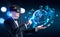 Businessman in vr glasses finger touch earth sphere with digital icons