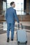 Businessman waiting for colleague in hotel while coming for business trip