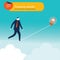 Businessman walking on balancing tight rope as it is being drawn