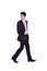 Businessman walking and looking back