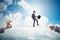 The businessman walking on tight rope in business concept