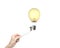 Businessman walking tightrope woman hand pulling lightbulb hot a