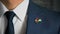 Businessman Walking Towards Camera With Country Flag Pin-Jordan