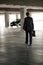 Businessman walking in underground parking