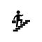 Businessman walks up the stairs