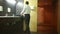 Businessman washing hands. Public toilet