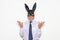 Businessman wearing a bunny mask in an Easter concept