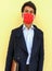 a businessman wearing coronavirus mask to protect from the coronavirus stock photo