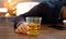 Businessman with whiskey bourbon glass, drunk sleeping