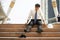 Businessman who are tired or stressed sit on the stairs