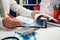 Businessman working and calculating, reads and writes reports. Office employee, table closeup. Business financial accounting