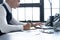 Businessman working with documents in the office. Financial planning specialist signing annual report