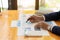 Businessman working with financial graph and calculator with the pen to analyze home expense account data.